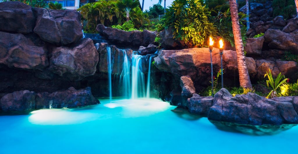 Deserted swimming pool in a peaceful garden surrounded by nature. Depositphotos 18698007 XL